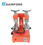 Front view of Gainford electric heating double head shoe stretcher machine with aluminum lasts and orange base.
