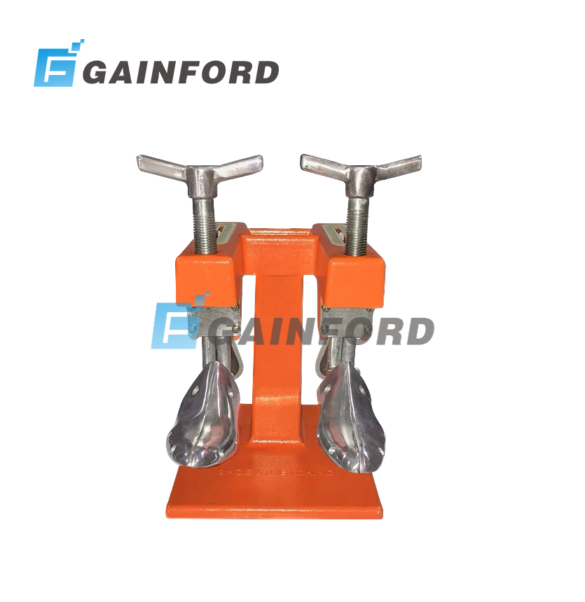 gainford-double-head-shoe-stretcher-machine Gainford double head shoe stretcher machine with manual handles and aluminum shoe lasts on a white background.